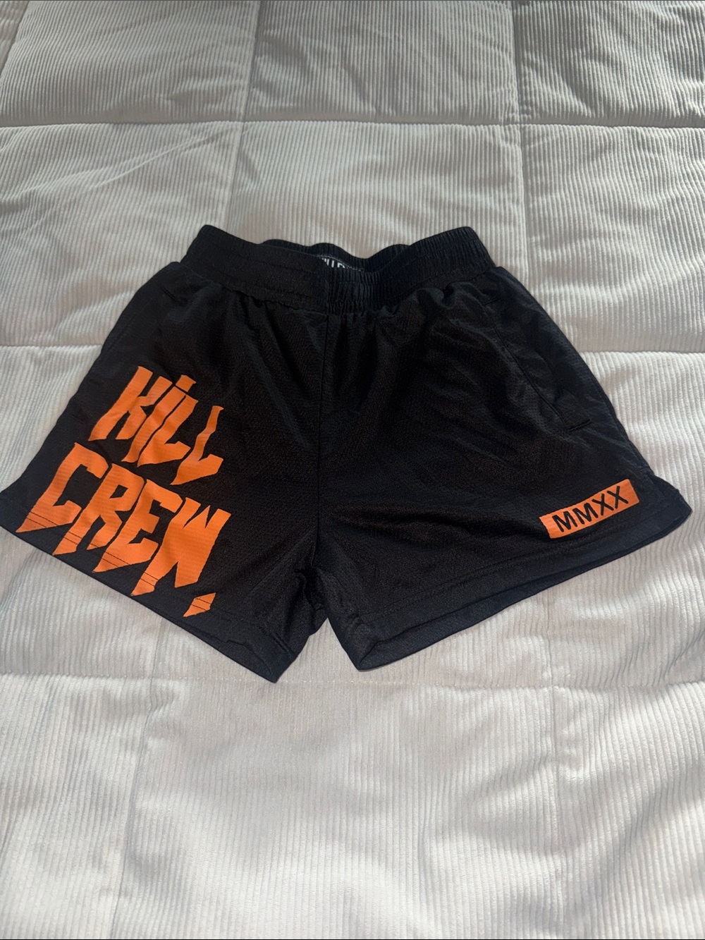 Black Athletic Shorts with Orange 'KILL CREW' Graphics